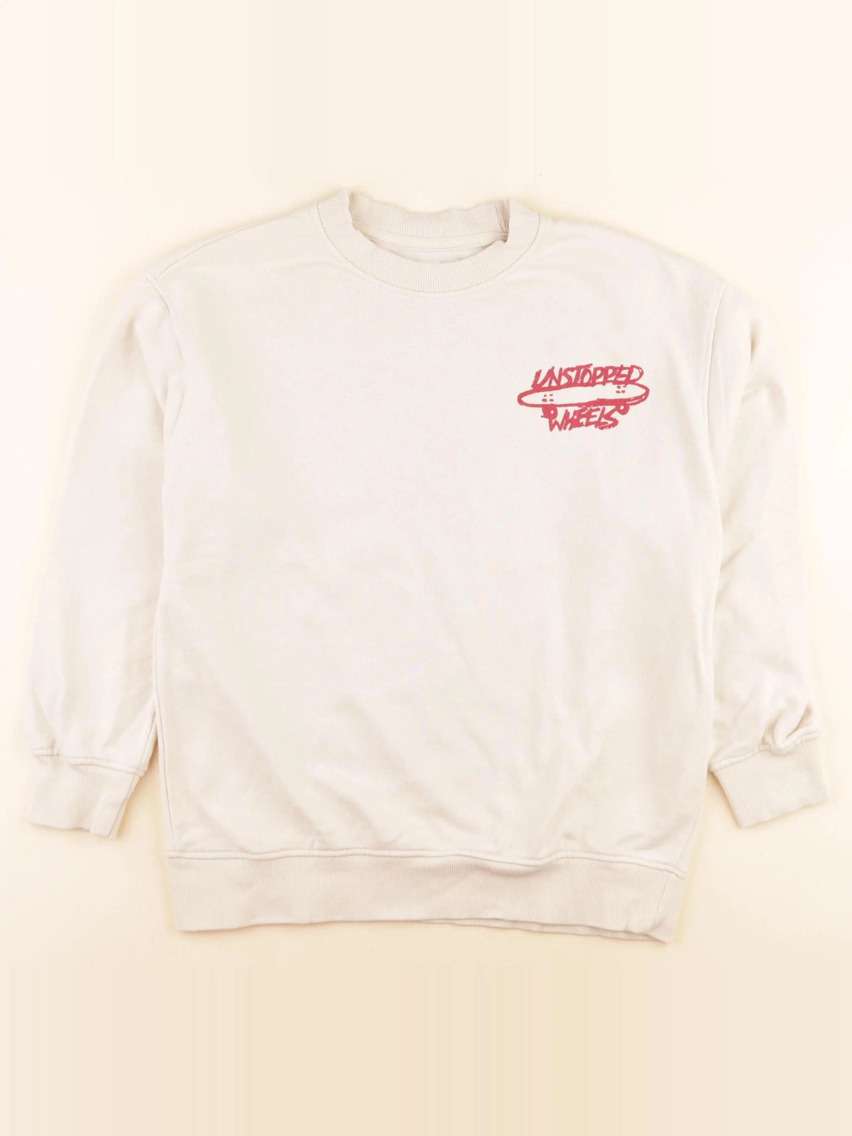 Sweat imprimé au dos beige