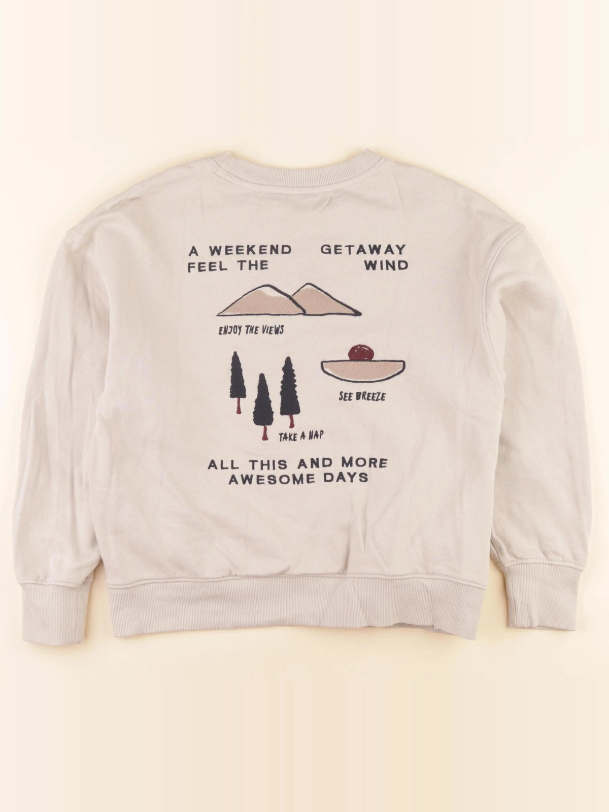 Sweat imprimé au dos beige