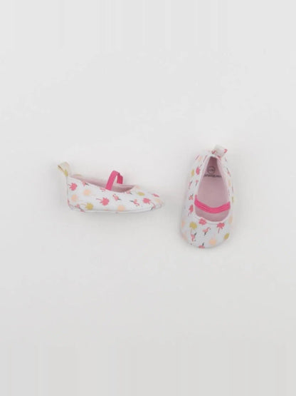 Chaussons blanc, rose