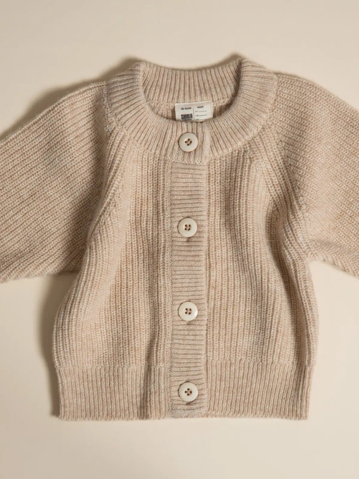 Le gilet bébé 100% laine beige nougat