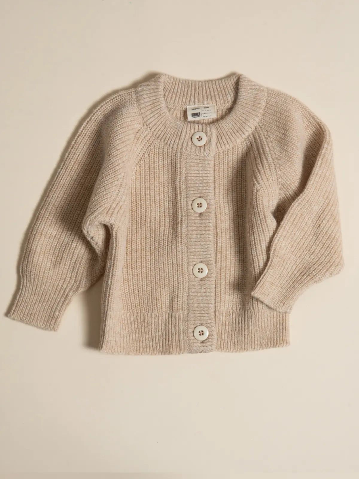 Le gilet bébé 100% laine beige nougat