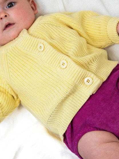 Le gilet bébé 100% coton bio jaune banane